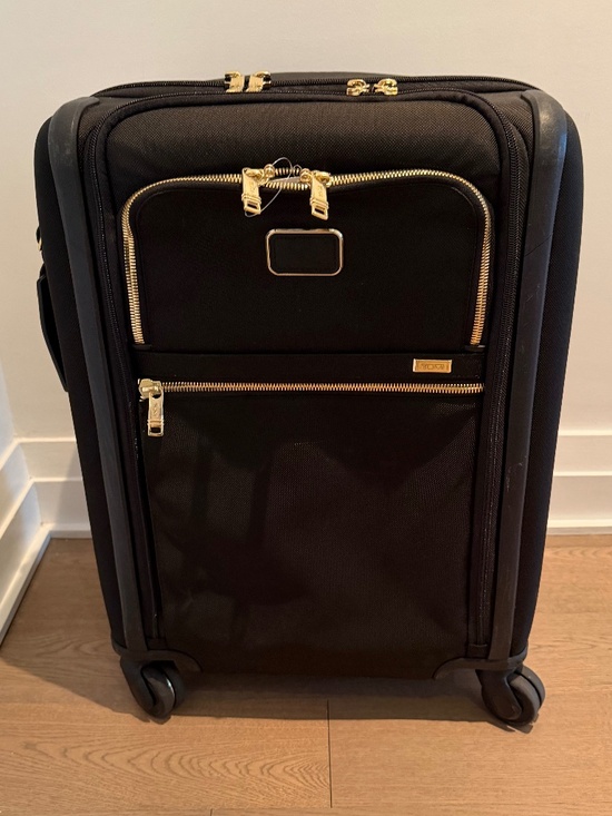 Tumi Other - Tumi Black and Gold Cabin (expandable) 4 roller luggage